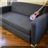 F55. Ikea upholstered futon. 27”h x 55”w x 30”:d - $95 